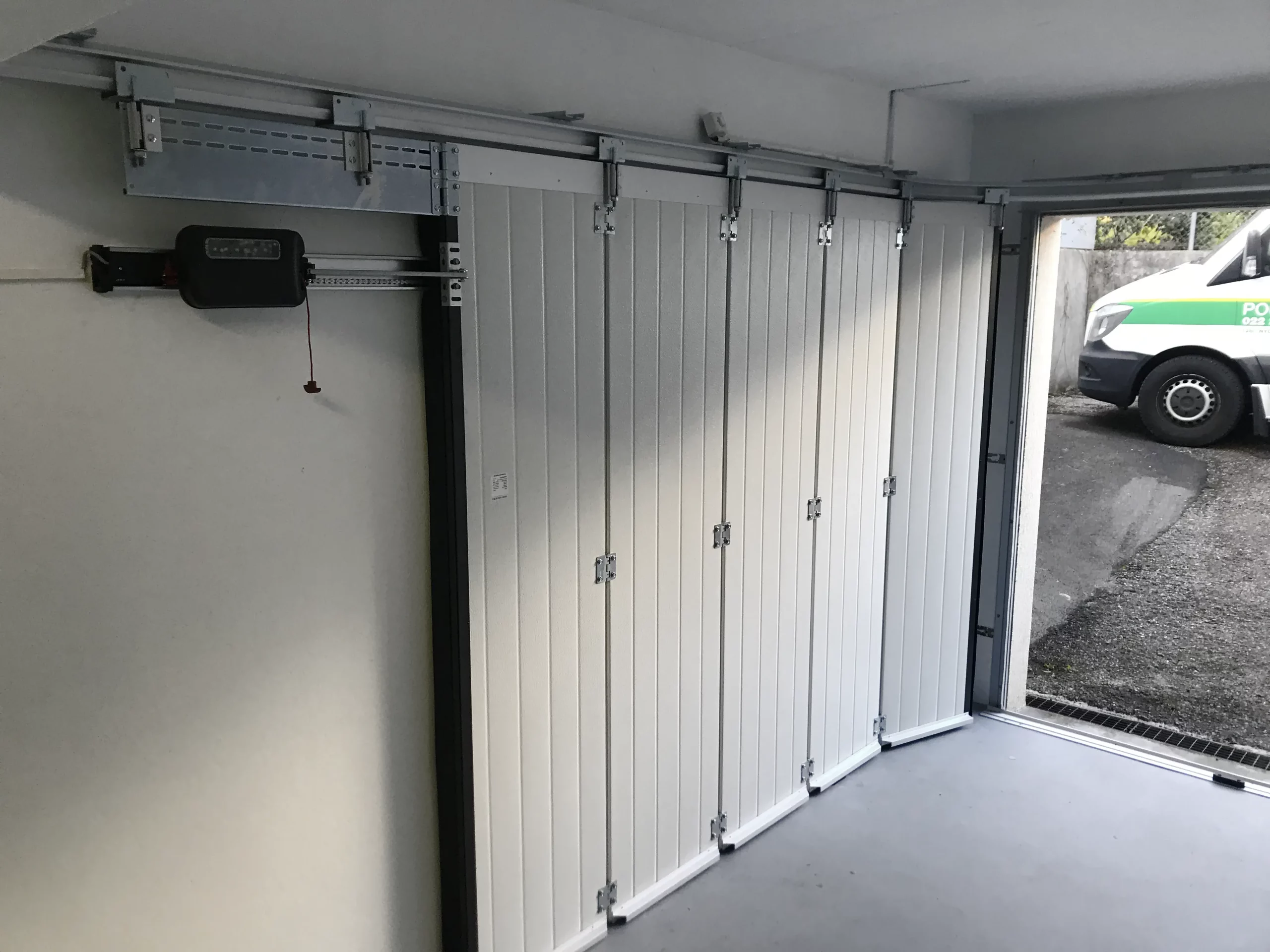 Porte de garage Latérale Pogar SA