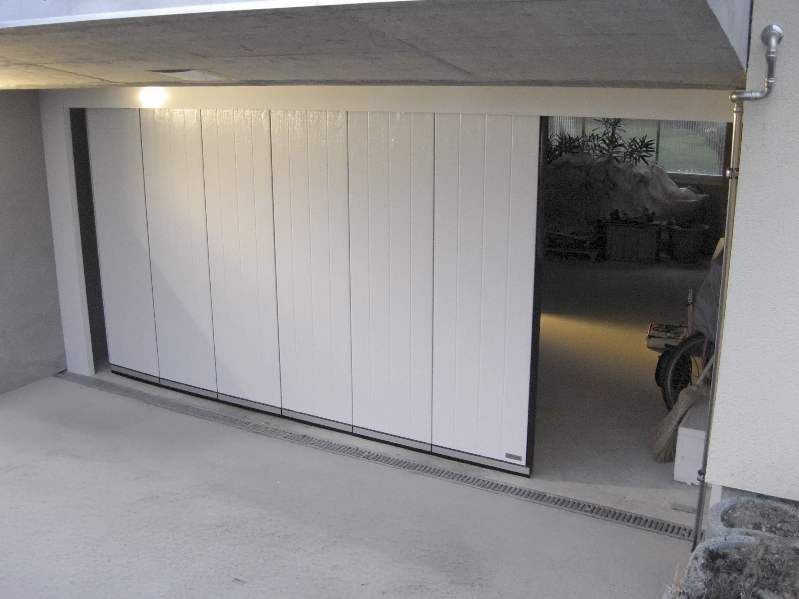 Porte de garage Latérale Pogar SA